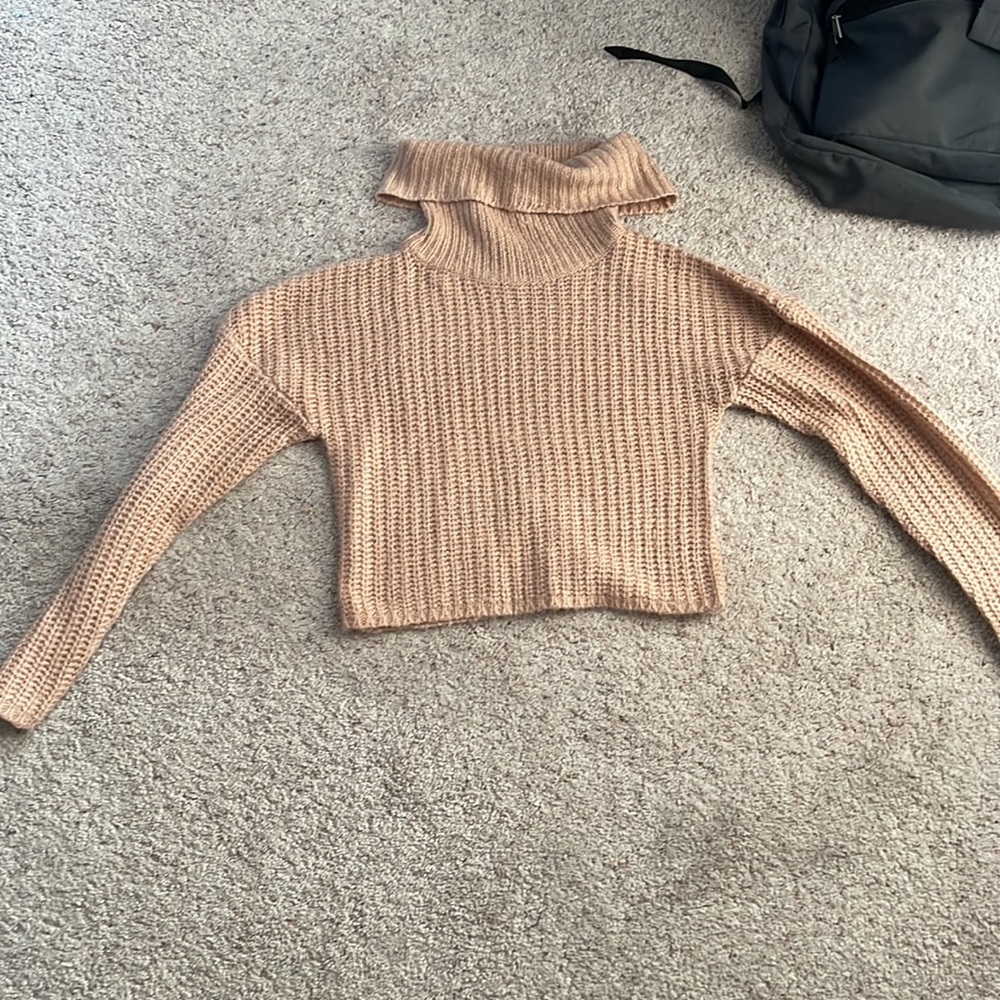 Pink knitted turtle neck